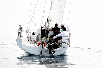 Crew in a boat during sailing yachts regatta