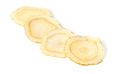 Close up of ginseng slices isolated on white background.