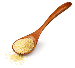 Raw hemp seeds in the wooden spoon, isolated on the white background.