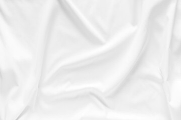 Plakat White fabric texture background. Cloth soft wave. Creases of satin, silk, and cotton.