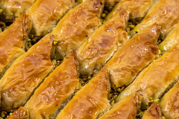 Pistachio sobiyet baklava dessert. Mediterranean cuisine delicacies. Close-up baklava