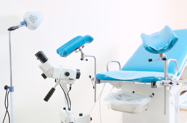 Gynecological room chair eguipment tool clinic lens white background