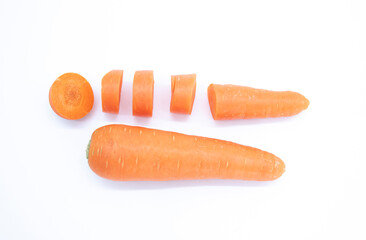 Fresh carrot and cut pieces isolated on white background as package design element