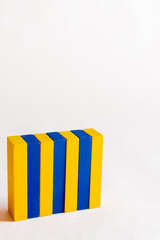 colored blue and yellow blocks on white background with copy space, ukrainian concept.