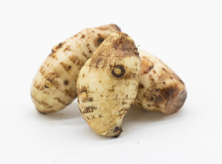 fresh taro root on white background , Arbi vegetable