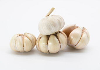 groups of garlic isolated on white background