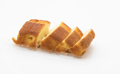 slices of pound cake isolated on white background, front view