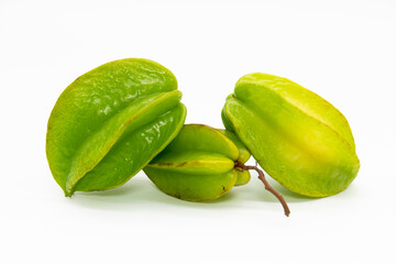 Raw carambolas or Star fruit on white background