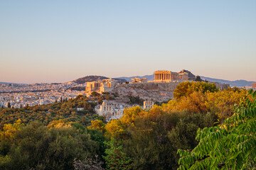 Fototapeta na wymiar View of Acropolis at sunrise from Plaka rooftop, Athens, Greece
