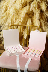 Assortment of luxury chocolate bonbons in box on a table.