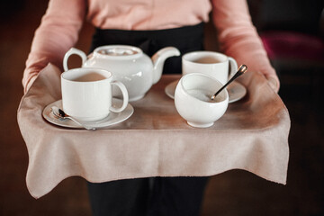 person holding a cup of coffee