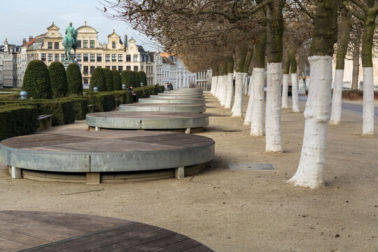 A view of The Kunstberg or Mont des Arts garden with whitewashed trees and covered fountains, Brussels, Belgium