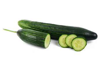 green whole cucumber, and cucumber slices side by side, isolated on a white background