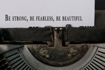 Fototapeta na wymiar Motivational and inspirational quote typed on an old classic typewriter.