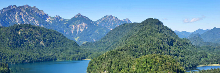 Panorama of Alpsee lake and the mountains of Bavaria, Germany