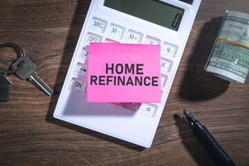 Home Refinance text on sticky note with a business objects.