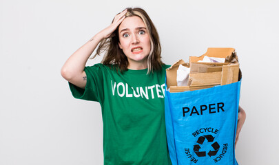 pretty caucasian woman feeling stressed, anxious or scared, with hands on head. ecology concept