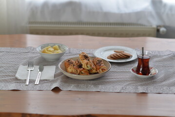 turkish breakfast with patty cashcavale cheese biscuits and tea