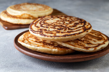 Arepa made of corn dough, traditional in the cuisine of Colombia and Venezuela