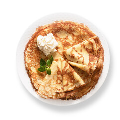 Russian traditional thin pancakes or blini for breakfast with whipped cream isolated on white background.