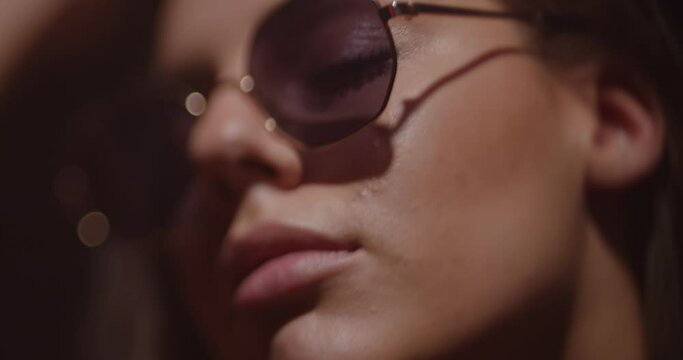 Beautiful girl with sunglasses, close up shot, selective focus