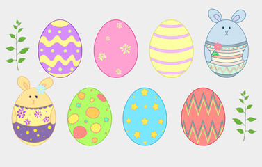 Easter eggs and bunnies.
Color illustration of Easter eggs. Eight colored eggs with patterns. Two rabbits: a boy and a girl. Idea for Easter cards and children's books.