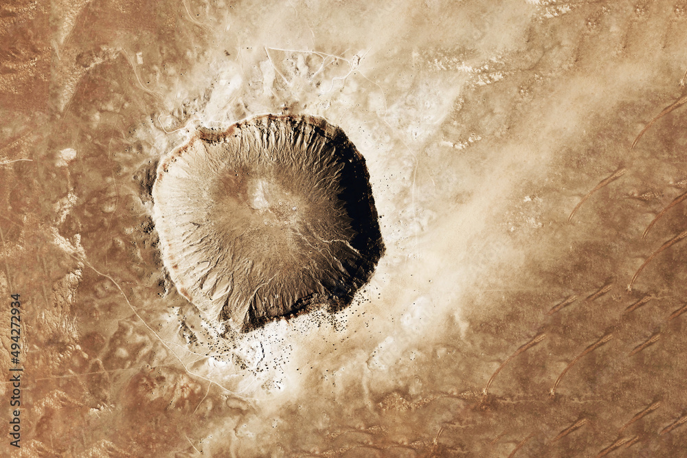 Wall mural crater from a meteorite, from space. elements of this image furnished by nasa
