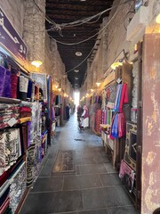 Souq Waqif is a souq in Doha, in the state of Qatar. The souq is known  for selling traditional garments, spices, handicrafts, and souvenirs