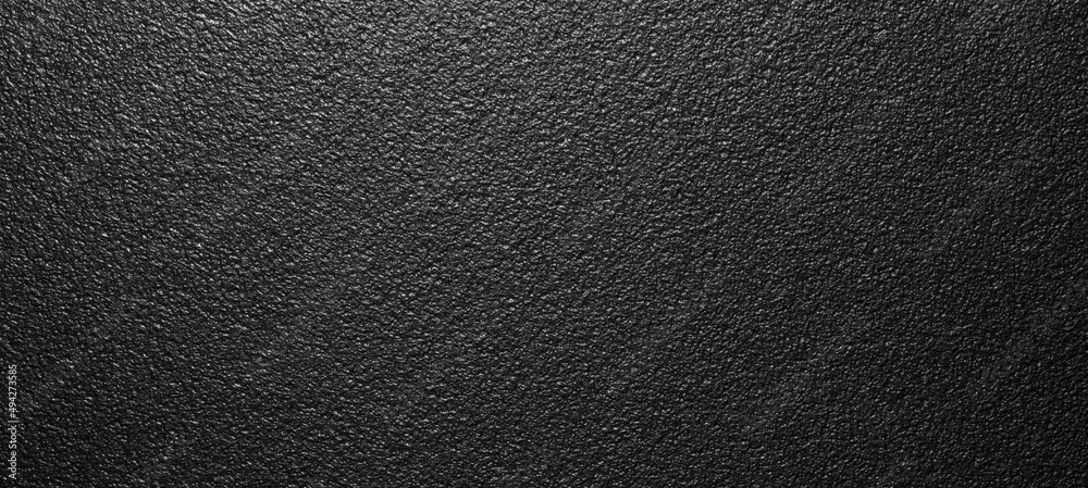 Wall mural the texture of black rough plastic.black matte plastic background.