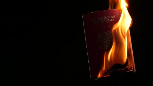 passport of the Russian Federation of a Russian citizen on a black background in smoke