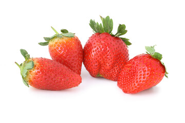 Four strawberries isolated on white