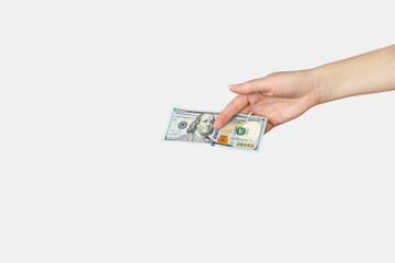 Closeup hand giving money isolated on white background. Money Financial and Payment Concept.