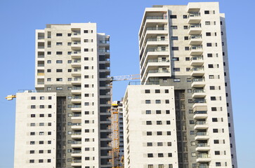 Fototapeta na wymiar New buildings in Israel. New quarters, modern high-rise buildings.