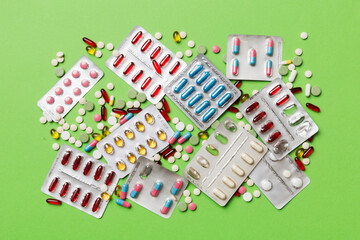 Protective face masks or surgical masks, medicine pills and thermometer on table background. Coronavirus disease. Corona virus concept. Space for text