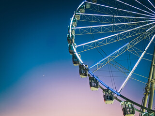 Sunset on the beach of Marseille with a ferris wheel