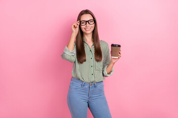 Photo of cool young brunette lady takeout coffee wear eyewear striped shirt isolated on pink color background