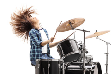 Energetic female drummer playing on a drum set