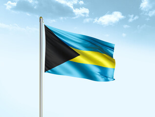 Bahamas national flag waving in blue sky with clouds. Bahamas flag. 3D illustration