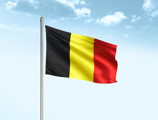 Belgium national flag waving in blue sky with clouds. Belgium flag. 3D illustration