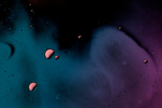 surreal space illustration, abstract planets and galaxy on dark background