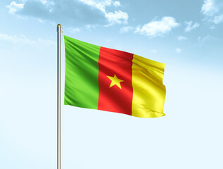 Fototapeta na wymiar Cameroon national flag waving in blue sky with clouds. Cameroon flag. 3D illustration