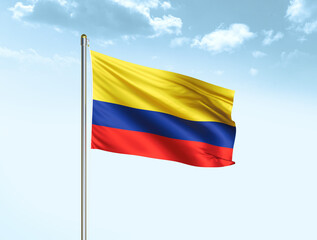 Obraz na płótnie Canvas Colombia national flag waving in blue sky with clouds. Colombia flag. 3D illustration