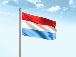 Luxembourg national flag waving in blue sky with clouds. Luxembourg flag. 3D illustration