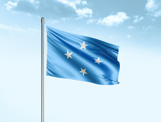 Micronesia national flag waving in blue sky with clouds. Micronesia flag. 3D illustration