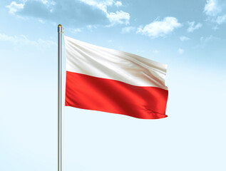Fototapeta na wymiar Poland national flag waving in blue sky with clouds. Poland flag. 3D illustration