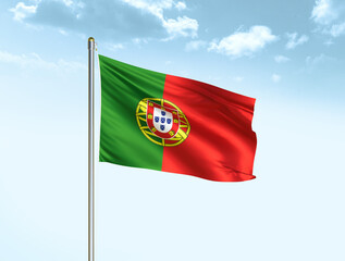 Portugal national flag waving in blue sky with clouds. Portugal flag. 3D illustration