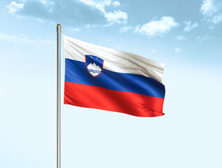Slovenia national flag waving in blue sky with clouds. Slovenia flag. 3D illustration