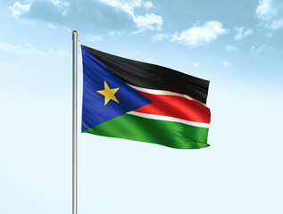 South Sudan national flag waving in blue sky with clouds. South Sudan flag. 3D illustration