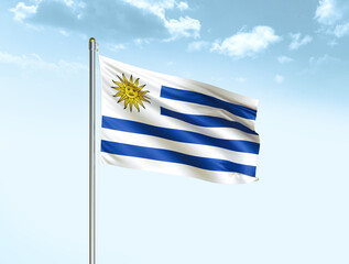 Uruguay national flag waving in blue sky with clouds. Uruguay flag. 3D illustration