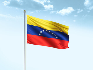 Fototapeta na wymiar Venezuela national flag waving in blue sky with clouds. Venezuela flag. 3D illustration